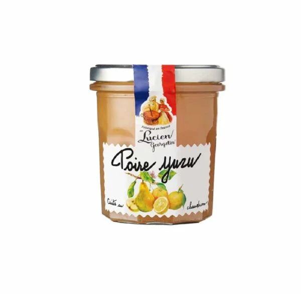 Jar of pear and yuzu jam with a colorful label on a white background