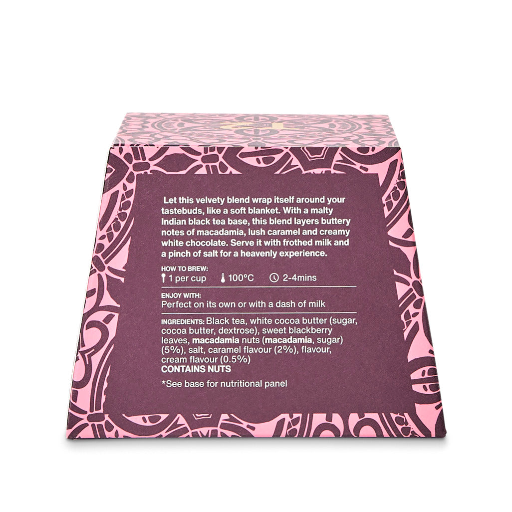 Tea packaging with pink and black design on a white background