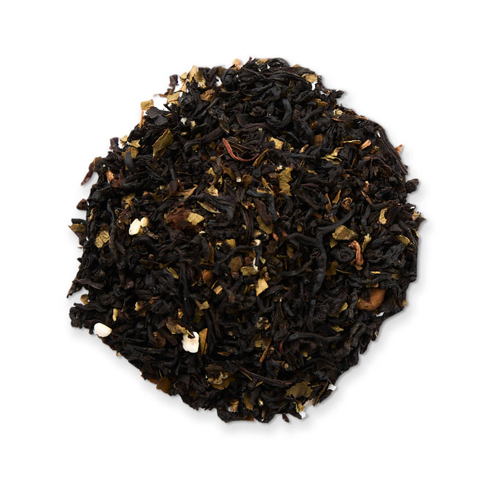 Black tea leaves on a white background