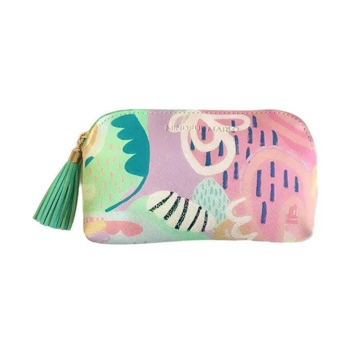 A rectangular zippered pouch with a colorful abstract print in pastel pink, purple, green, and blue, featuring a green tassel zipper pull and gold-tone hardware. The brand name &