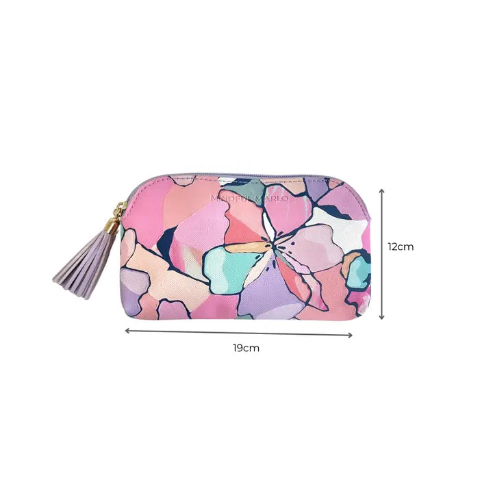 A zip-around cosmetic pouch with a colorful abstract floral pattern in pink, purple, blue, and peach, featuring a lavender tassel zipper pull. Black dimension lines indicate a width of 19cm and a height of 12cm on a plain white background.