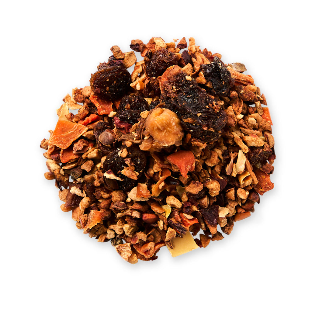 Tea blend with dried fruits and leaves on a white background