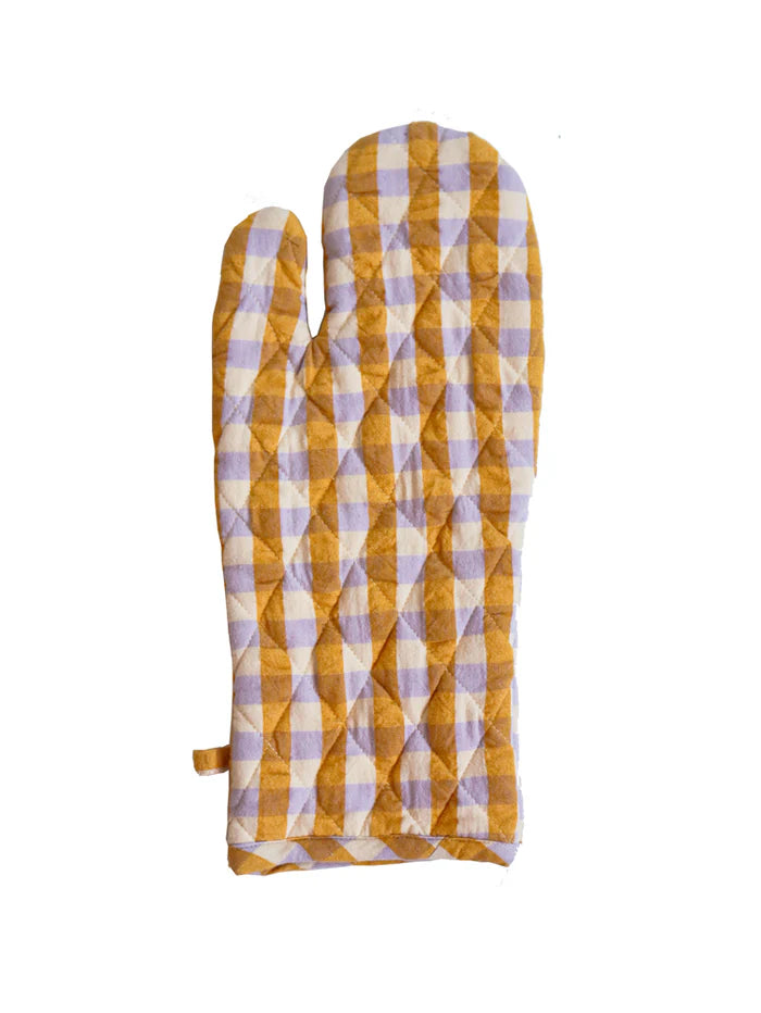 Quilted oven mitt with yellow and purple checkered pattern on a white background