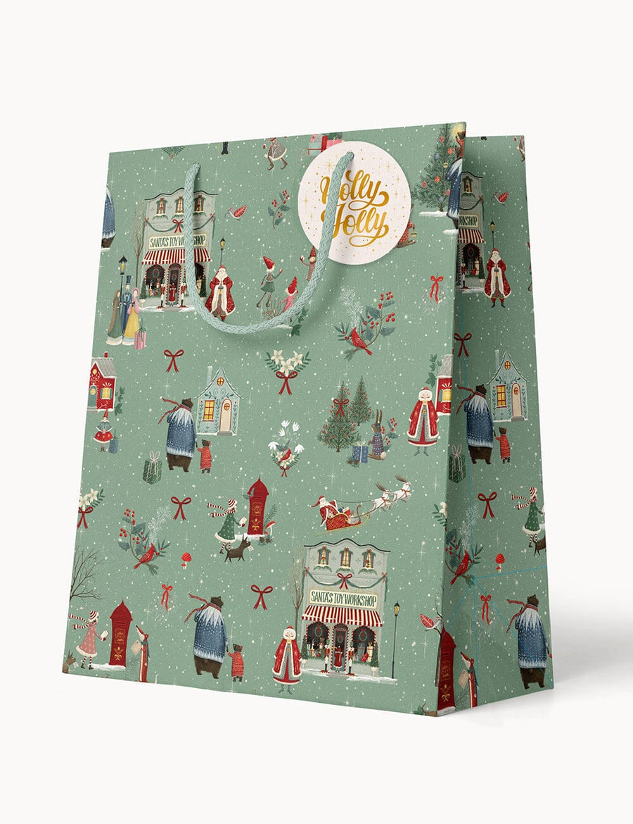 Christmas-themed gift bag with festive design and 'Festive' label on a white background