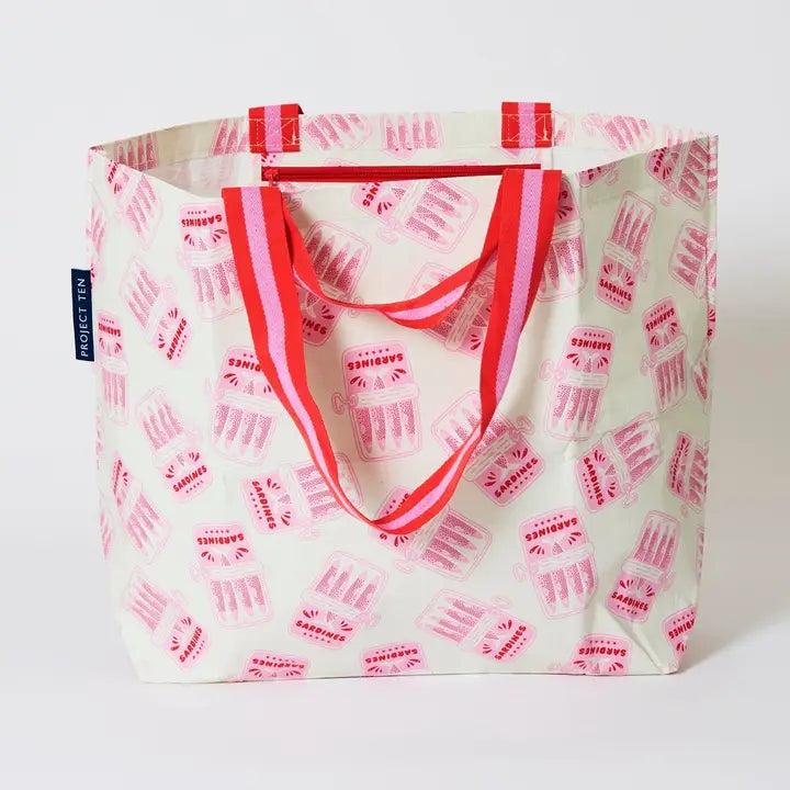 Tote bag with pink and red pattern on a white background