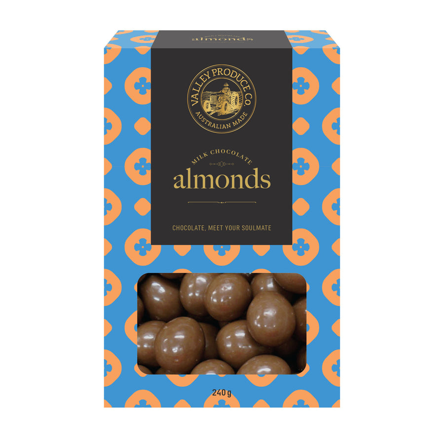 Box of Valley Produce Co chocolate almonds with a blue and orange pattern.