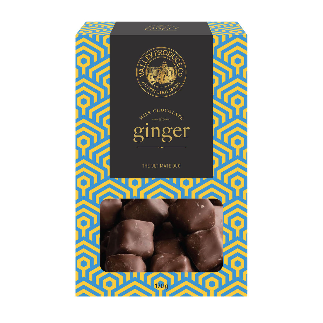 Box of milk chocolate ginger candies with a decorative blue and yellow pattern on a white background.