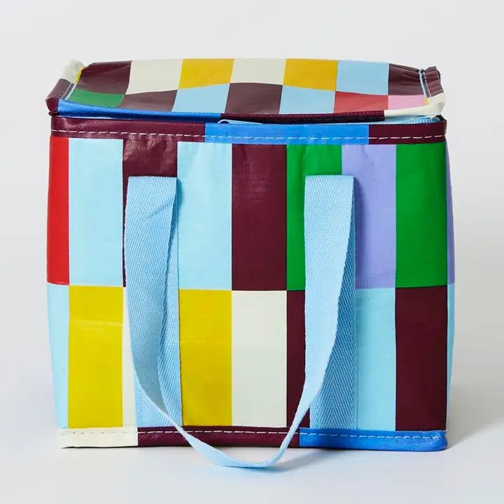 Colorful checkered bag with a blue handle on a white background