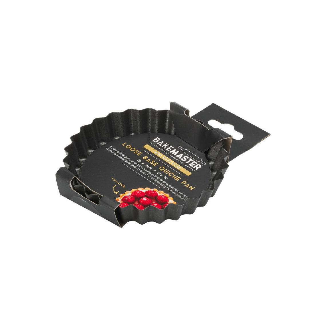 Loose base quiche pan with packaging on a white background