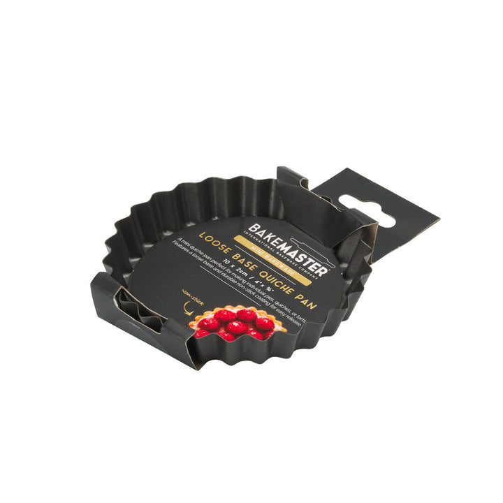 Loose base quiche pan with packaging on a white background