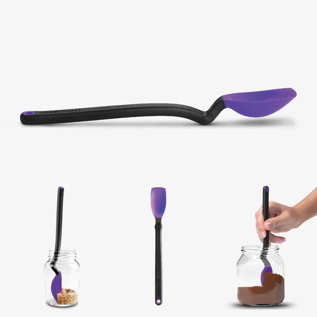 Purple and black spoon with a long handle, shown in use on a white background.