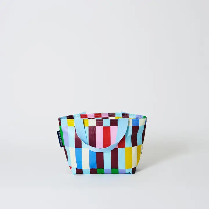Colorful checkered bag on a light gray background