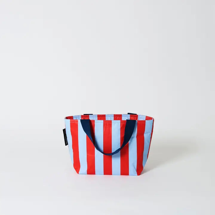 Red, white, and blue striped tote bag on a light gray background