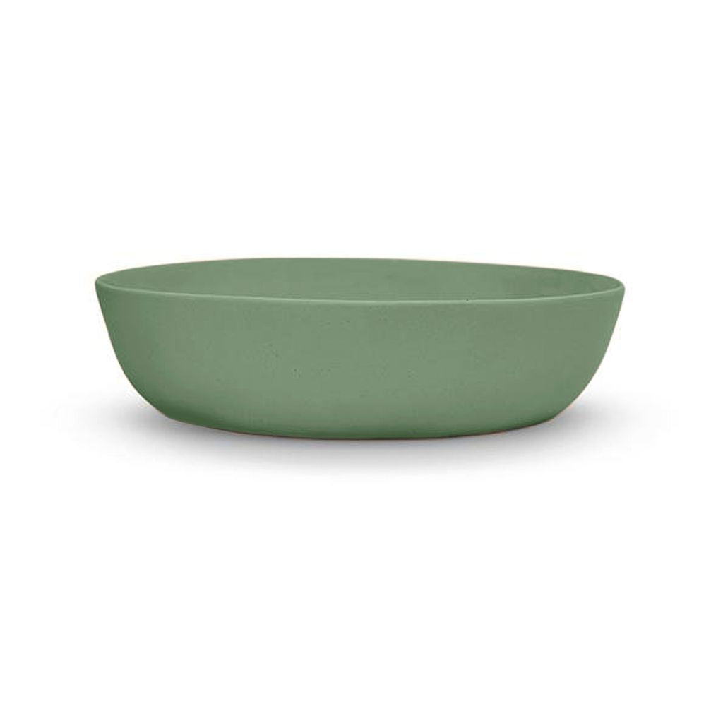 Green ceramic bowl on a white background