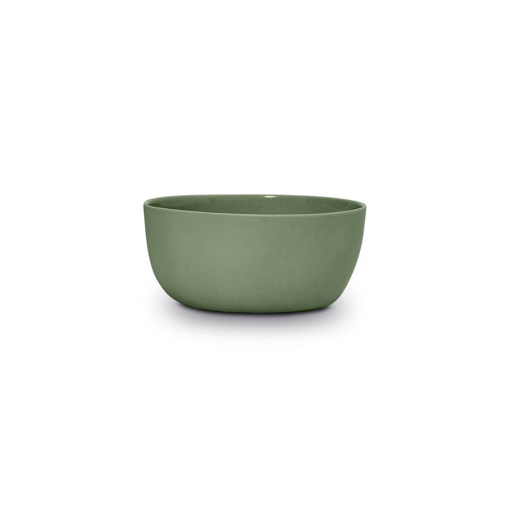 Green ceramic bowl on a white background