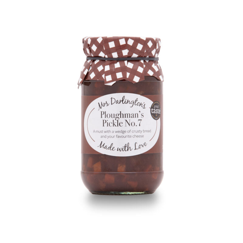 A glass jar of Mrs Darlington's Ploughman's Pickle No. 7 with a brown and white checkered lid wrap, on a white background.