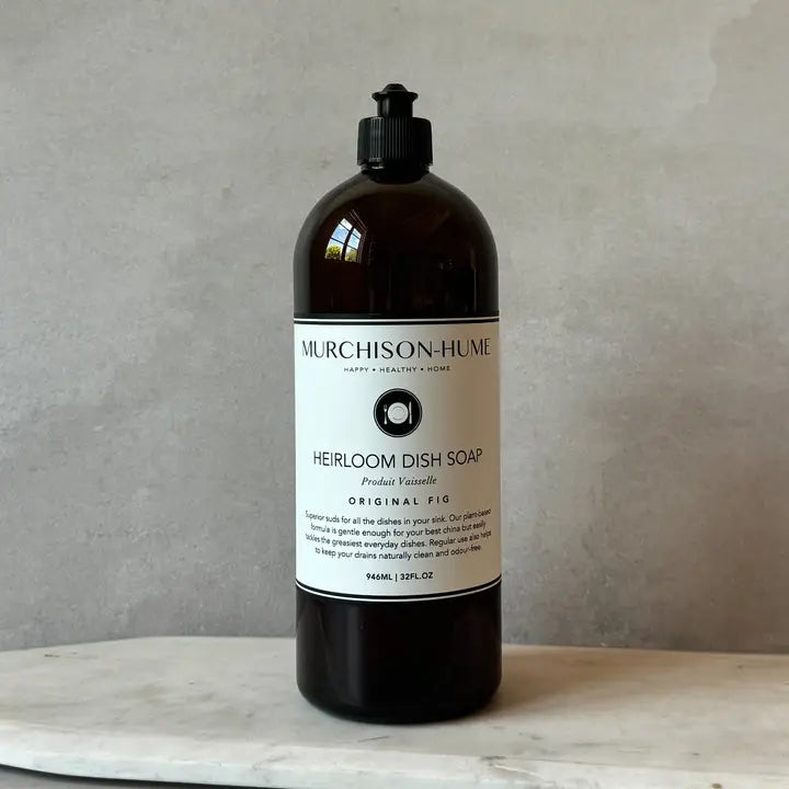 Murchison-Hume dish soap bottle on a marble surface with a gray background