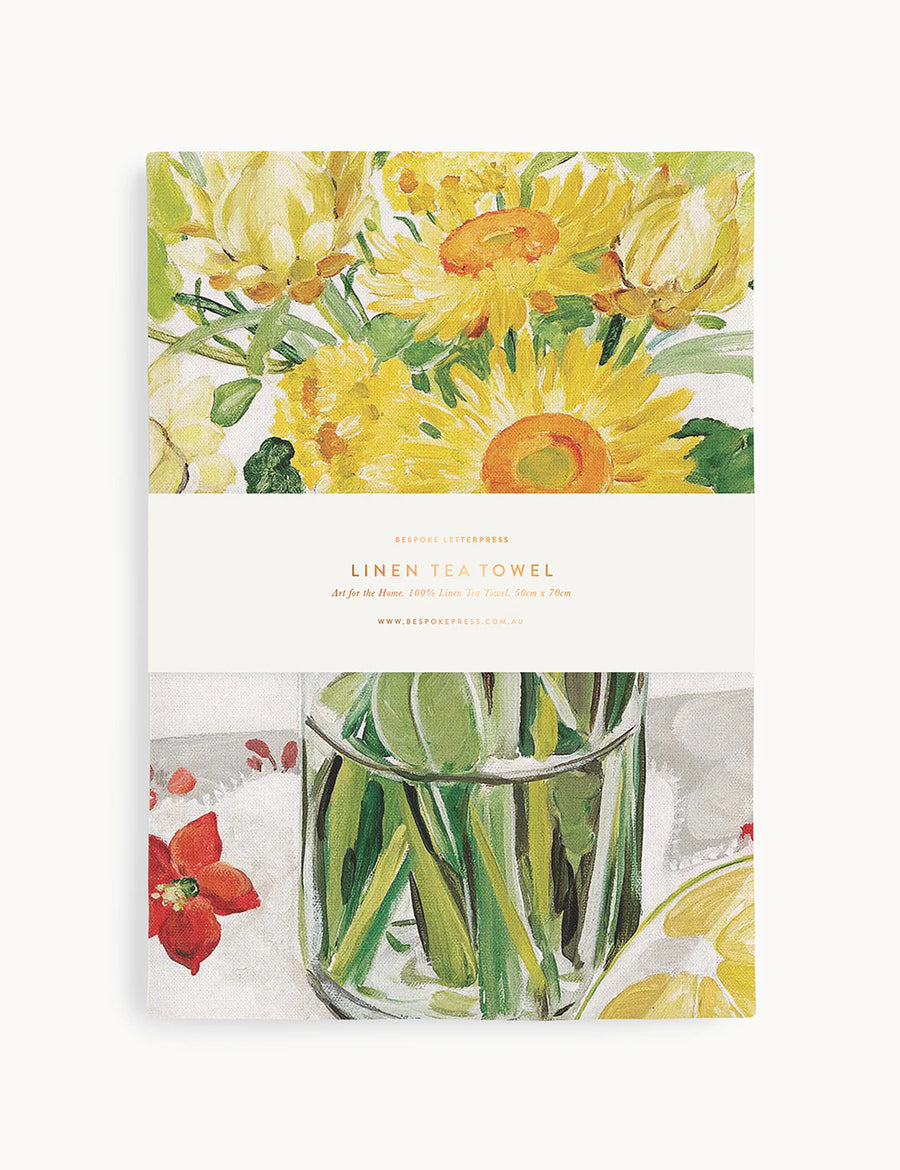 Linen tea towel packaging with floral design