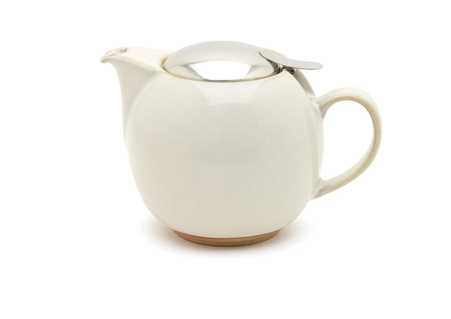 White ceramic teapot with a lid on a white background