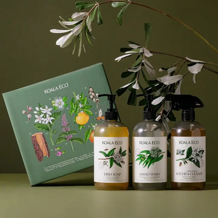 Koala Eco cleaning products with a green box featuring botanical illustrations on a green background.