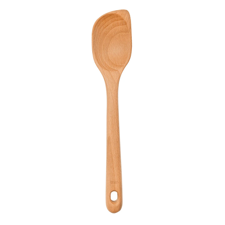 Wooden spoon on white background