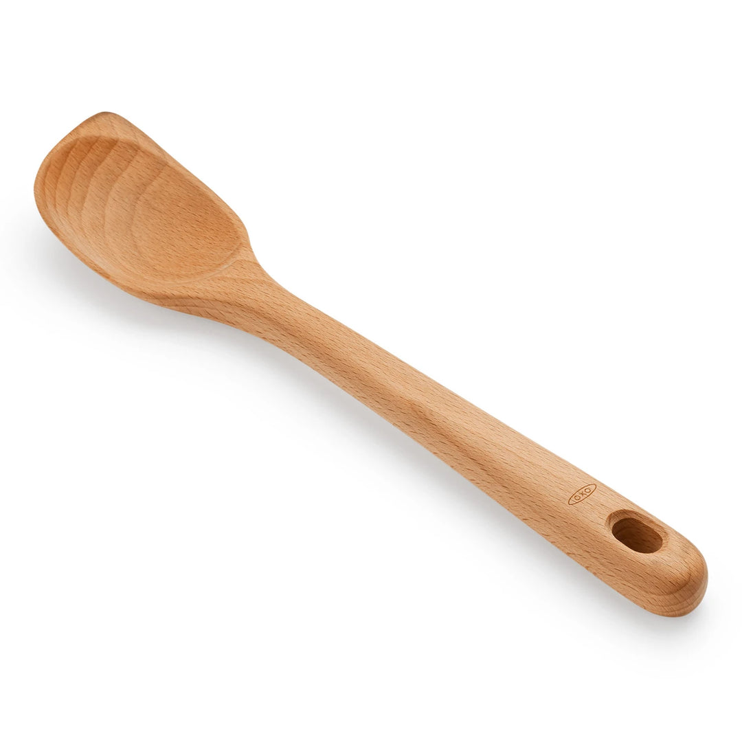 Wooden spoon on a white background
