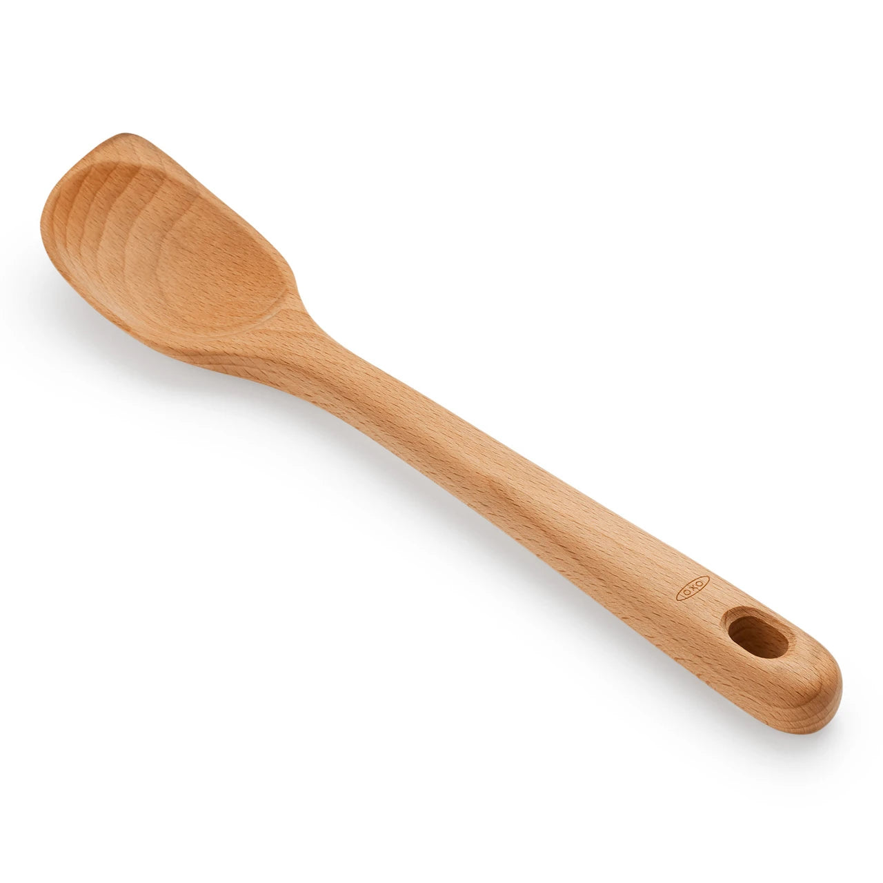 Wooden spoon on a white background