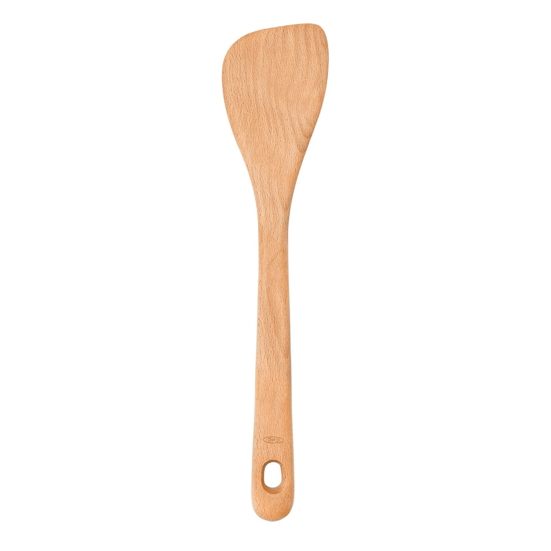 Wooden spatula on a white background