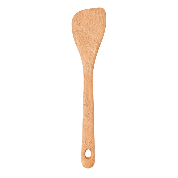 Wooden spatula on a white background
