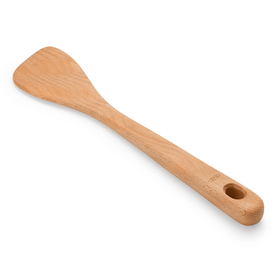 Wooden spatula on a white background