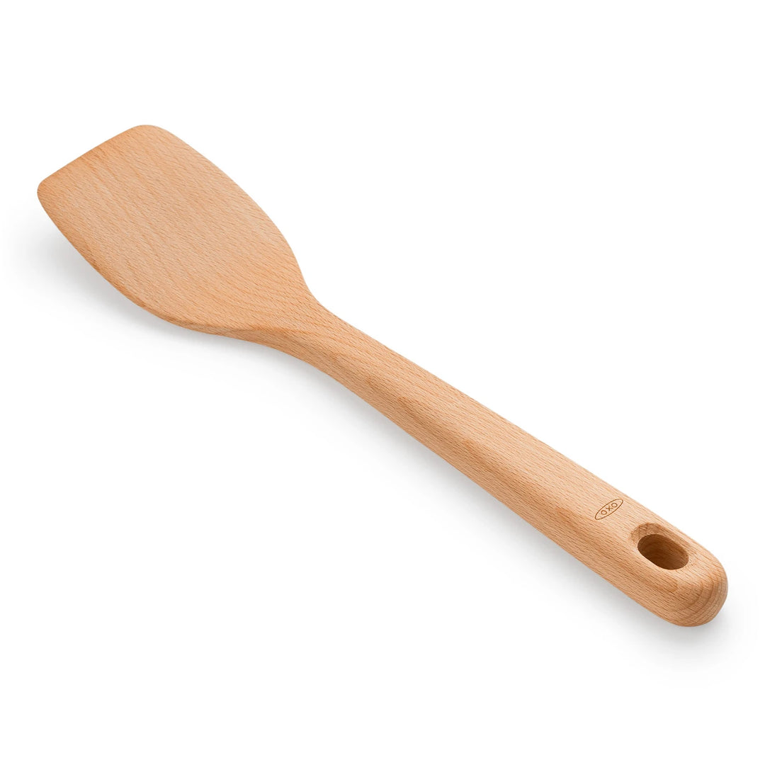 Wooden spatula on a white background