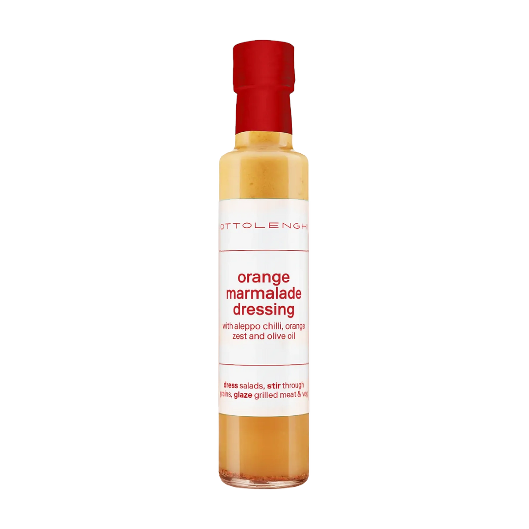 A bottle of Ottolenghi orange marmalade dressing on a white background