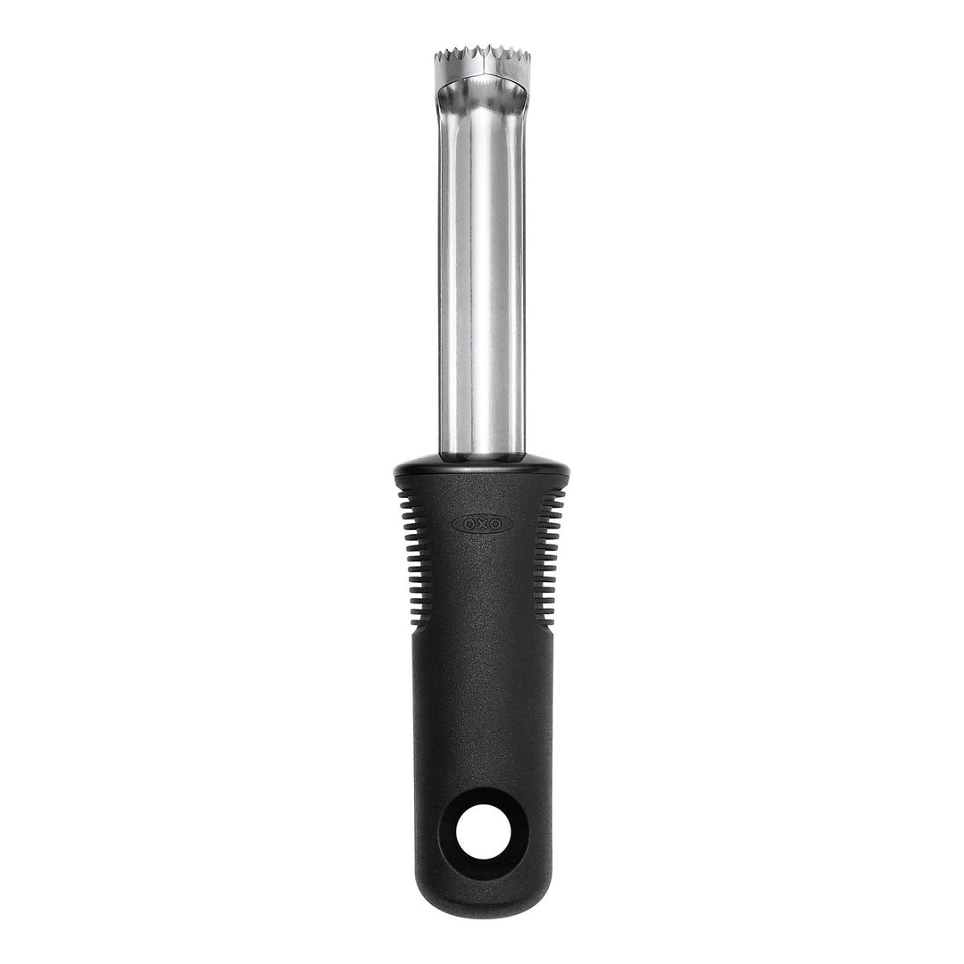 Black and silver apple corer on a white background
