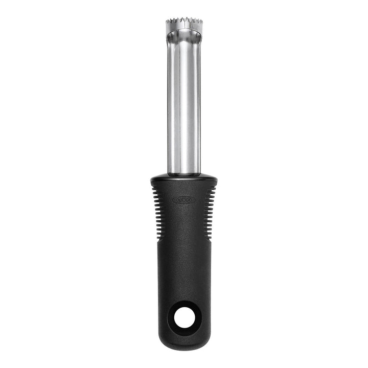 Black and silver apple corer on a white background