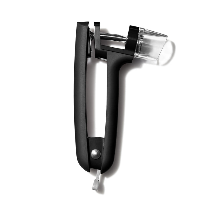 Black kitchen tool with clear component on a white background