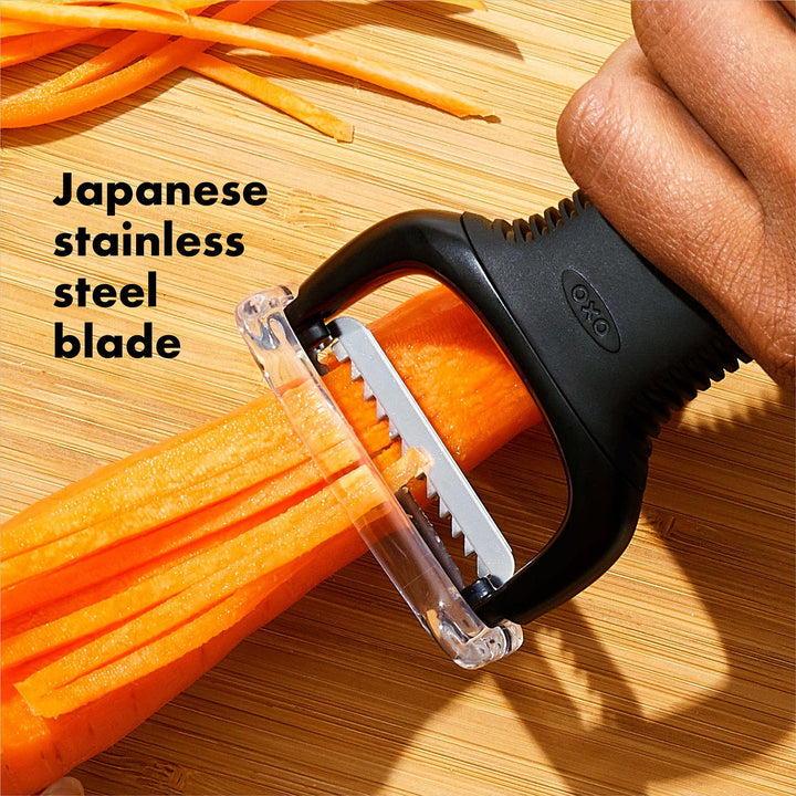 Vegetable peeler with Japanese stainless steel blade on a wooden surface