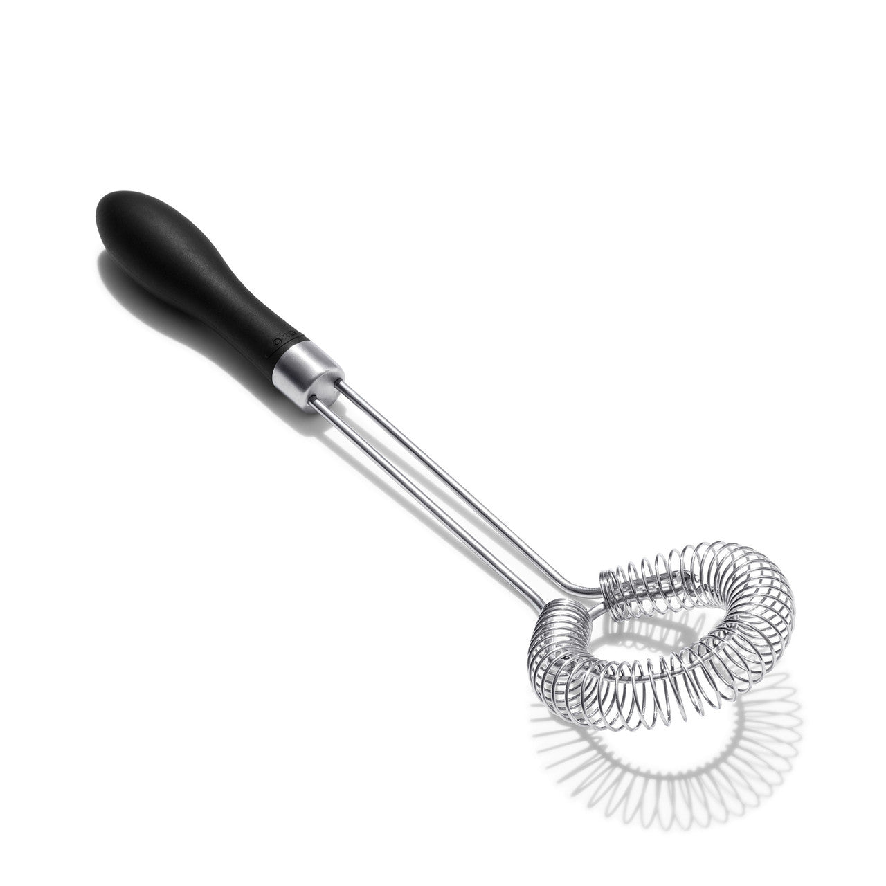 Metallic sauce and gravy whisk with black handle on a white background
