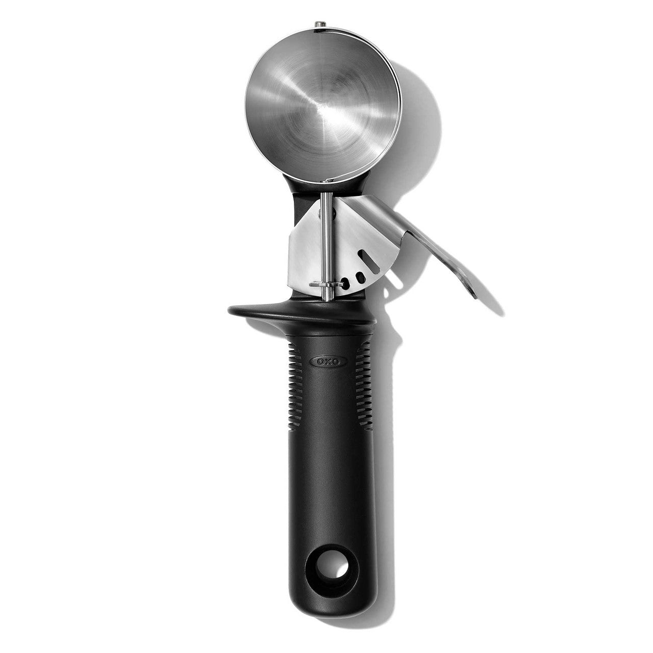 Metallic kitchen tool with black handle on a white background