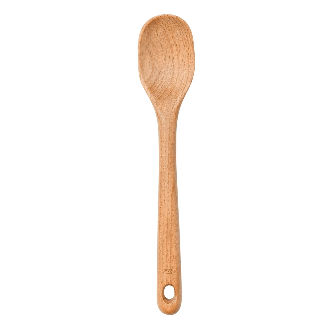 Wooden spoon on a white background