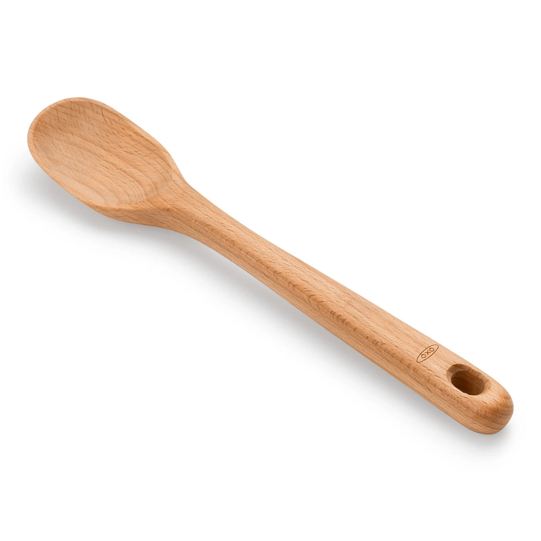 Wooden spoon on a white background