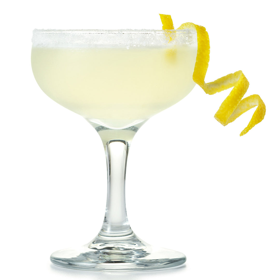 Cocktail in a glass with a lemon twist on a white background