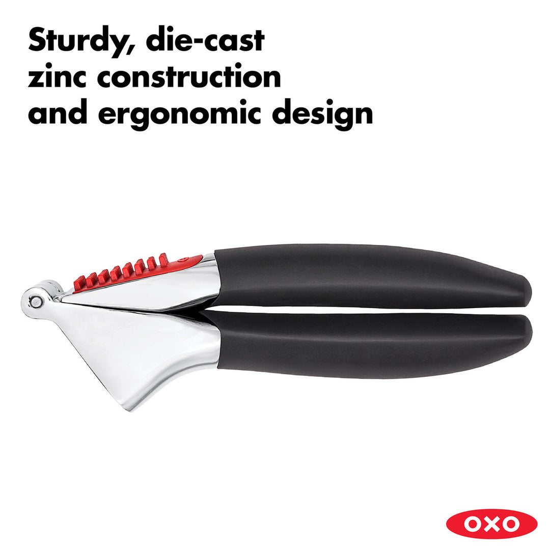 Oxo garlic press with text about construction and design on a white background