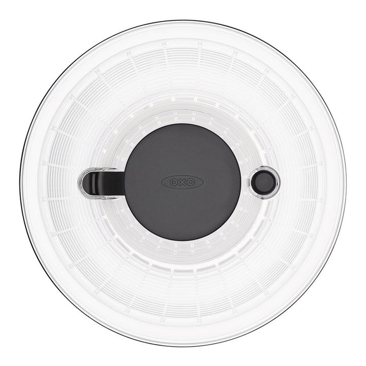 Clear lid with black handle and OXO logo on a white background