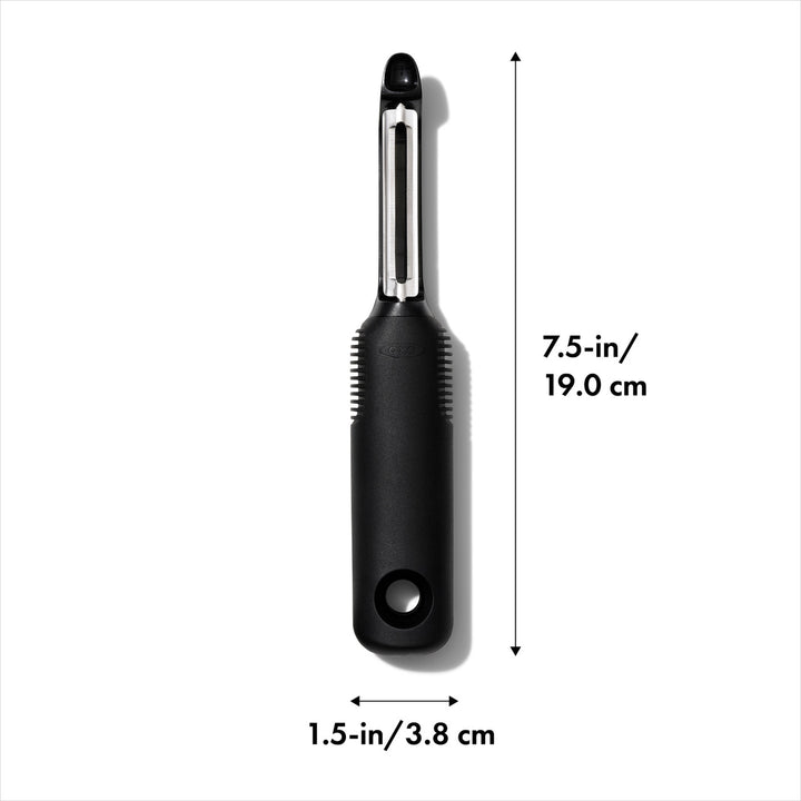 Black vegetable peeler with measurements on a white background