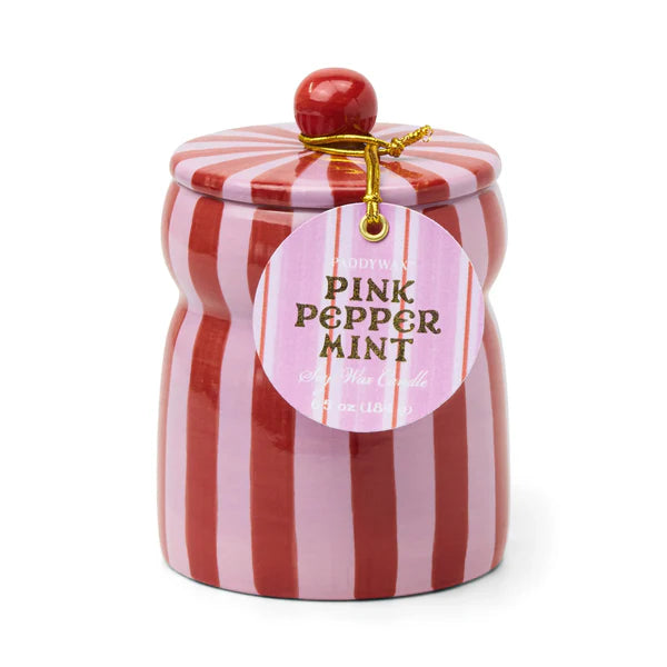 Striped pink and red jar candle with a 'Pink Pepper Mint' label on a white background