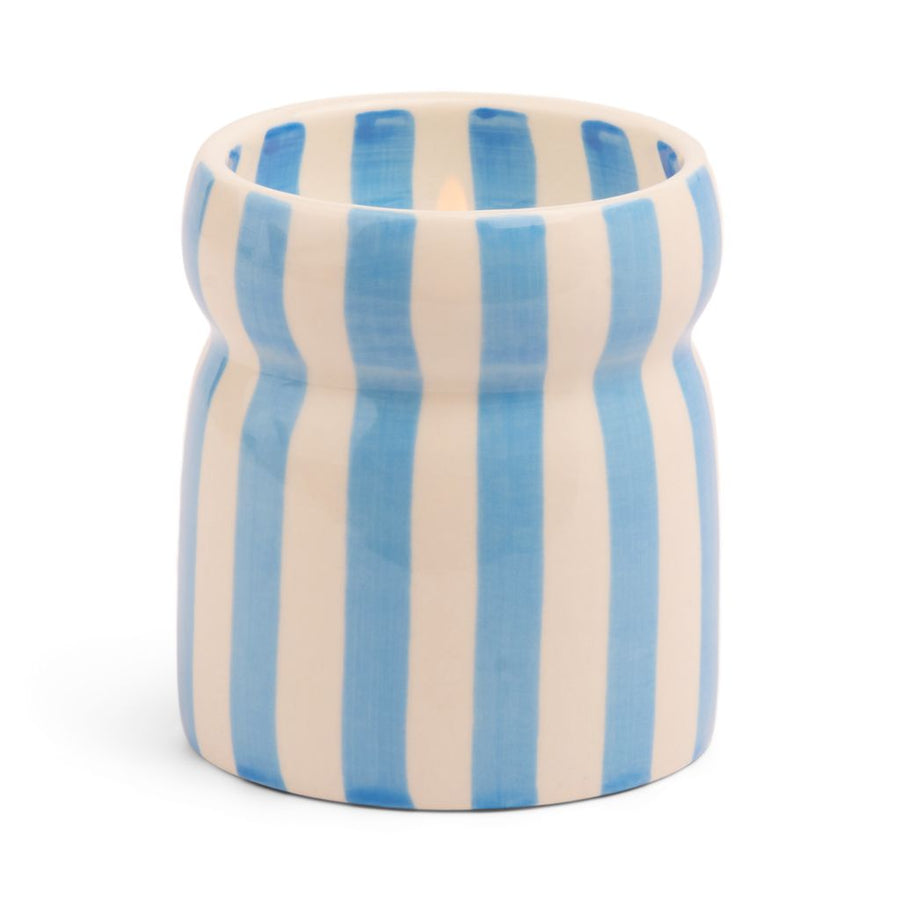Ceramic candle holder with blue and white striped pattern on a white background