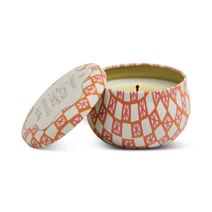 Paddywax cactus flowers candle in a small decorative tin with lid on a white background 
