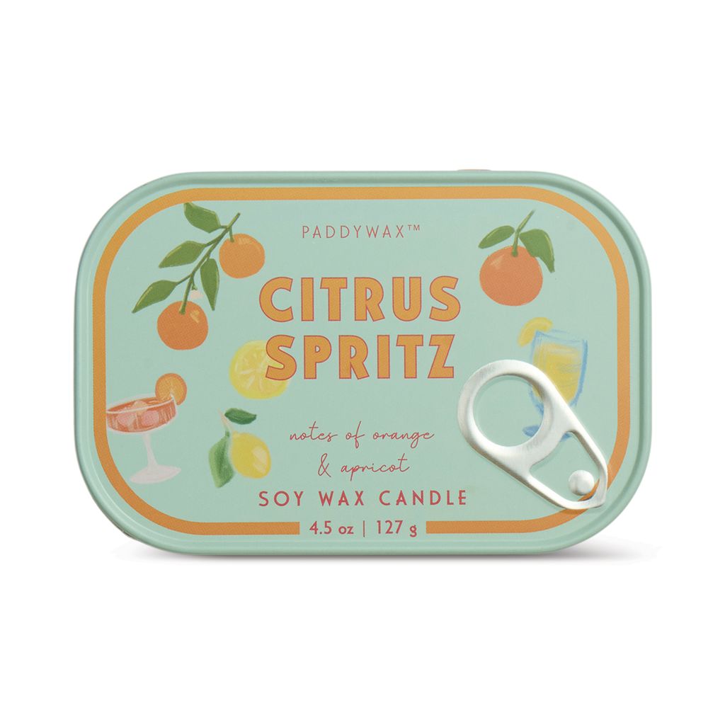 Paddywax Citrus Spritz candle tin with illustrations of citrus fruits on a white  background