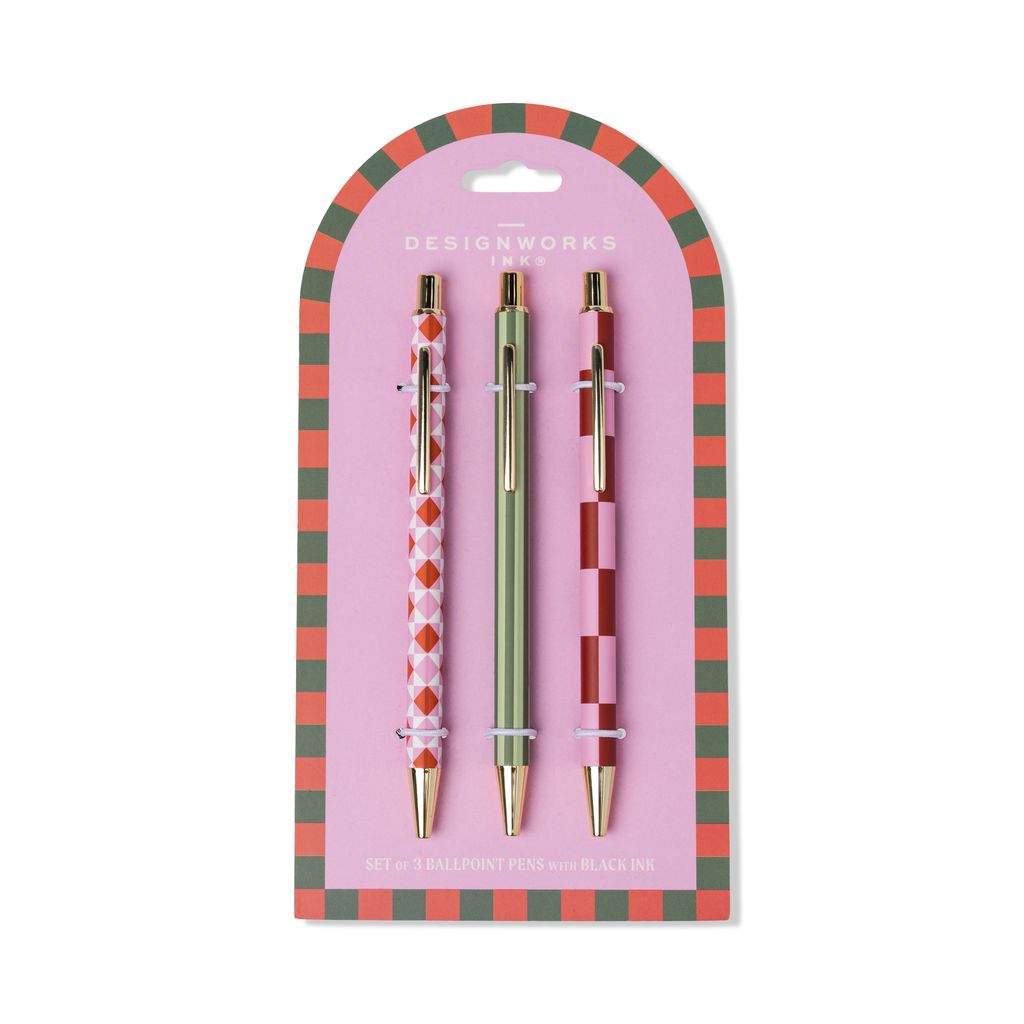 Three pens in a decorative packaging with a pink and green checkered border.