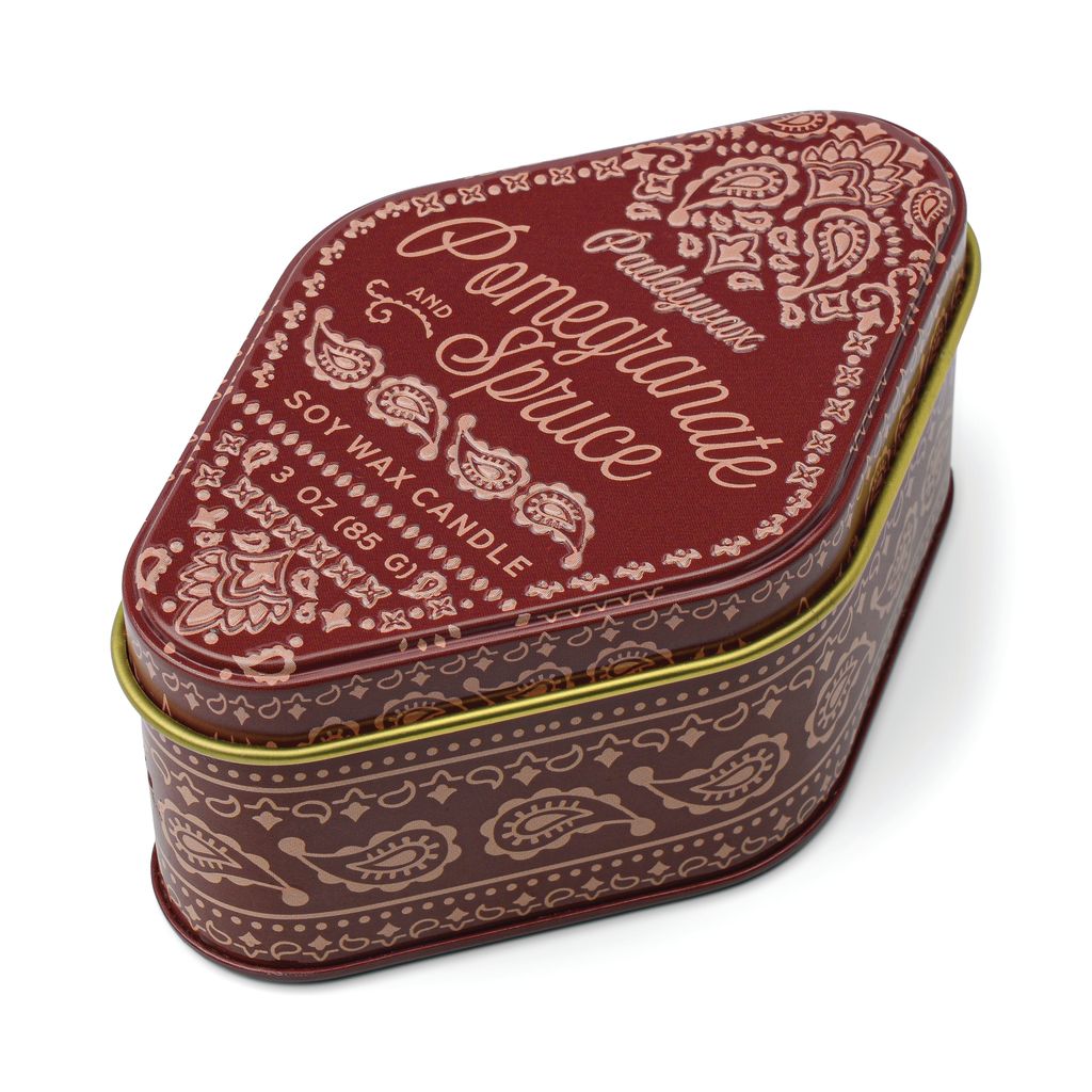 Decorative candle tin with paisley pattern and text on a white background